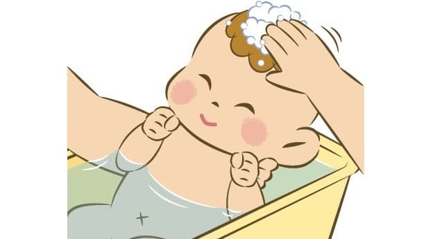 赤ちゃんが頭を洗ってもらっているイラスト